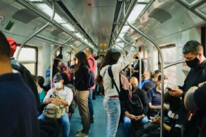 people in train during daytime
